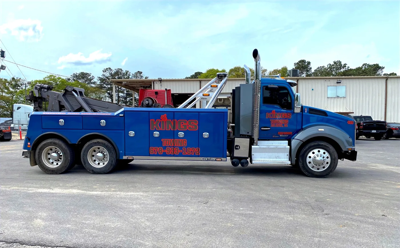 Rotator crane uprighting an overturned trailer – heavy recovery Atlanta | King's Towing
